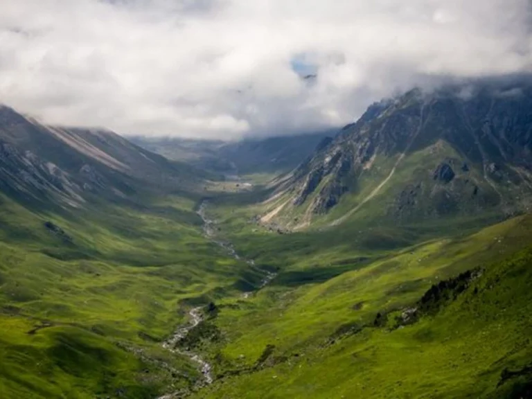 Cloud-covered mountain peak in Ile-Alatau National Park