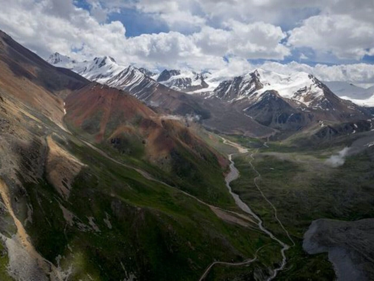 Green valley and mountain slopes in Ile-Alatau National Park near Almaty