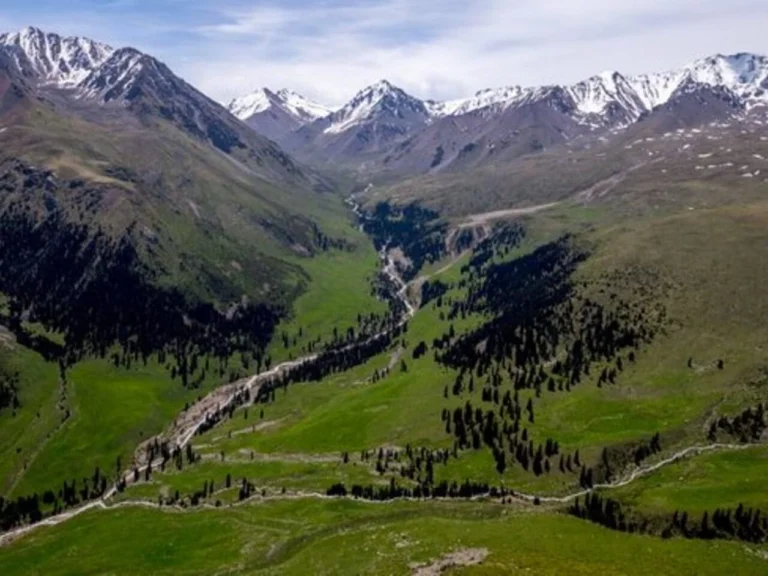 High mountain ridge with melting snow in Ile-Alatau National Park