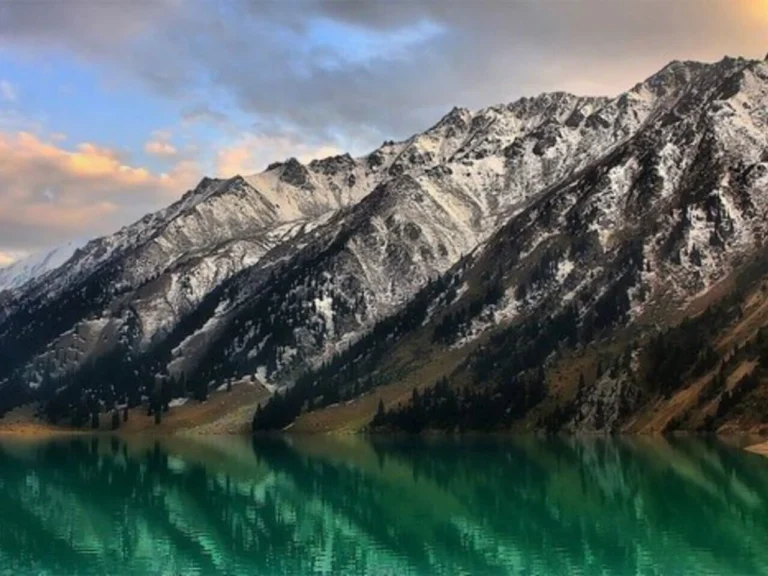 Big Almaty Lake with mountain reflections in Ile-Alatau National Park, Kazakhstan