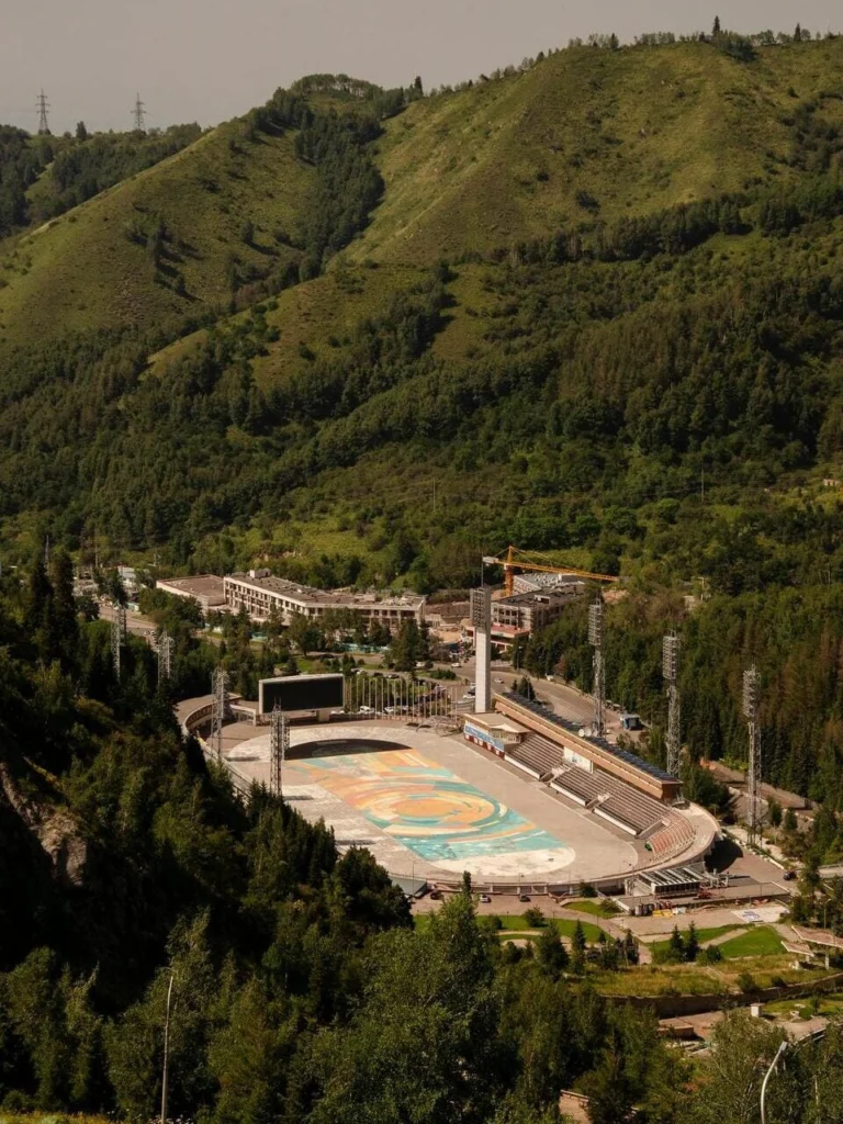 Summer aerial view of the Medeo stadium area in the green mountains of Almaty.